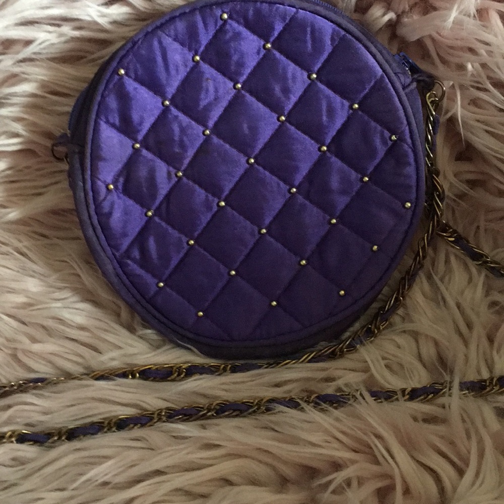 Purple studded handbag